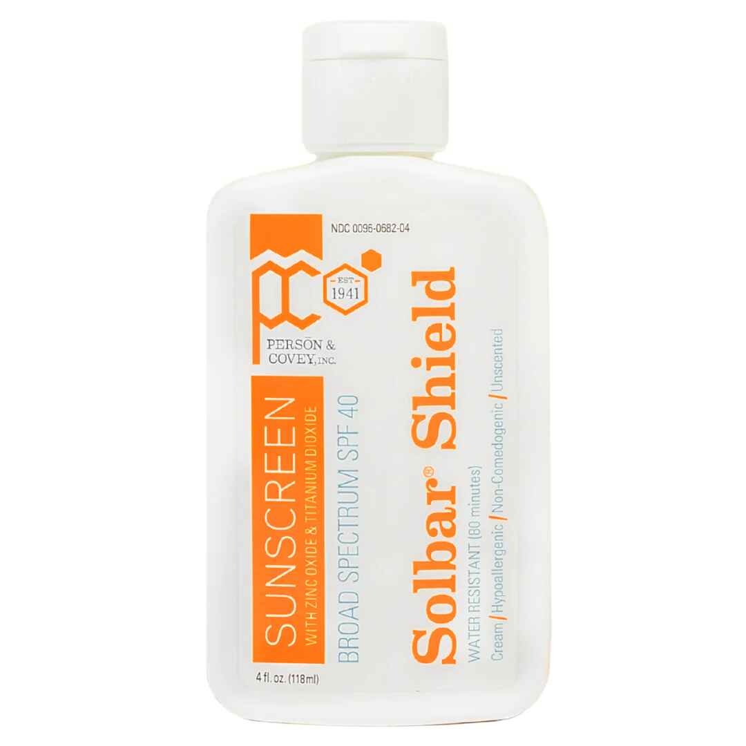 Person Covey Inc SOLBAR Shield SPF 40.